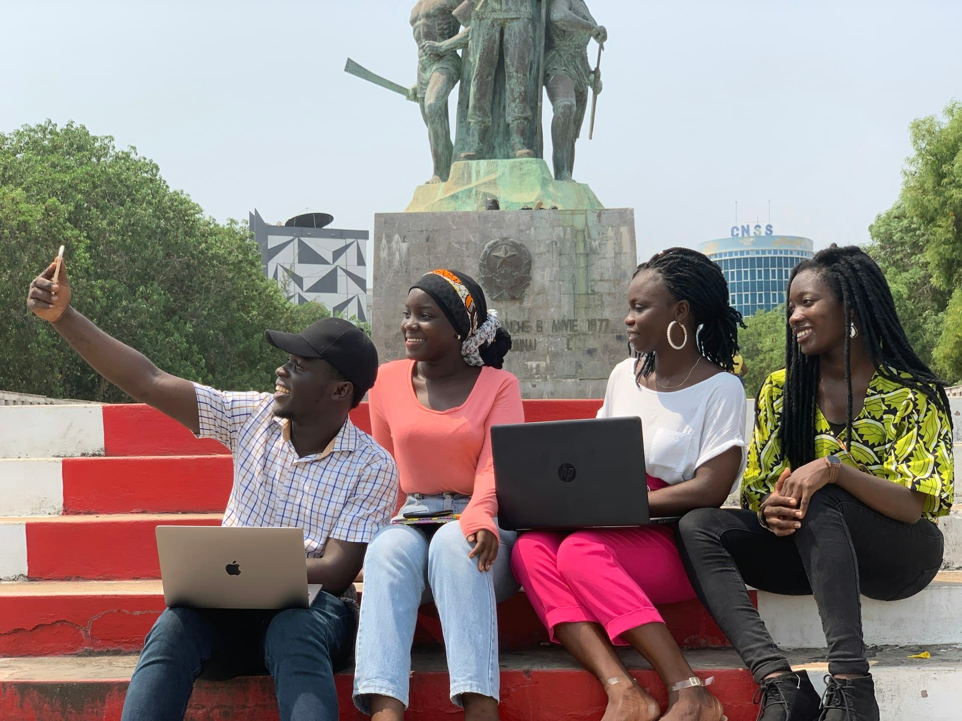 An African team collaborating on a community impact project
